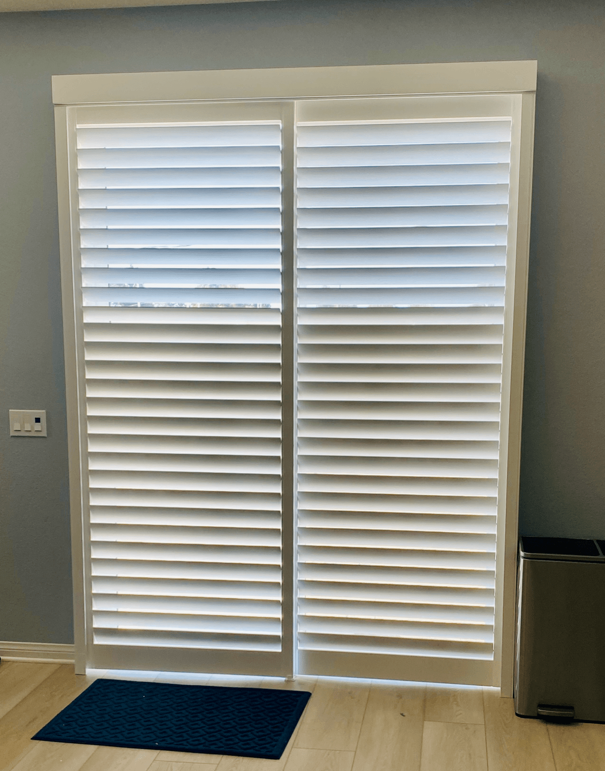 Side-by-side comparison of composite and wood plantation shutters